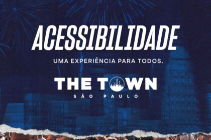 Cartaz do festival The Town São Paulo com fundo azul, fogos de artifício e prédios ilustrados. Em destaque, a frase: 'Acessibilidade – Uma experiência para todos. THE TOWN São Paulo'.